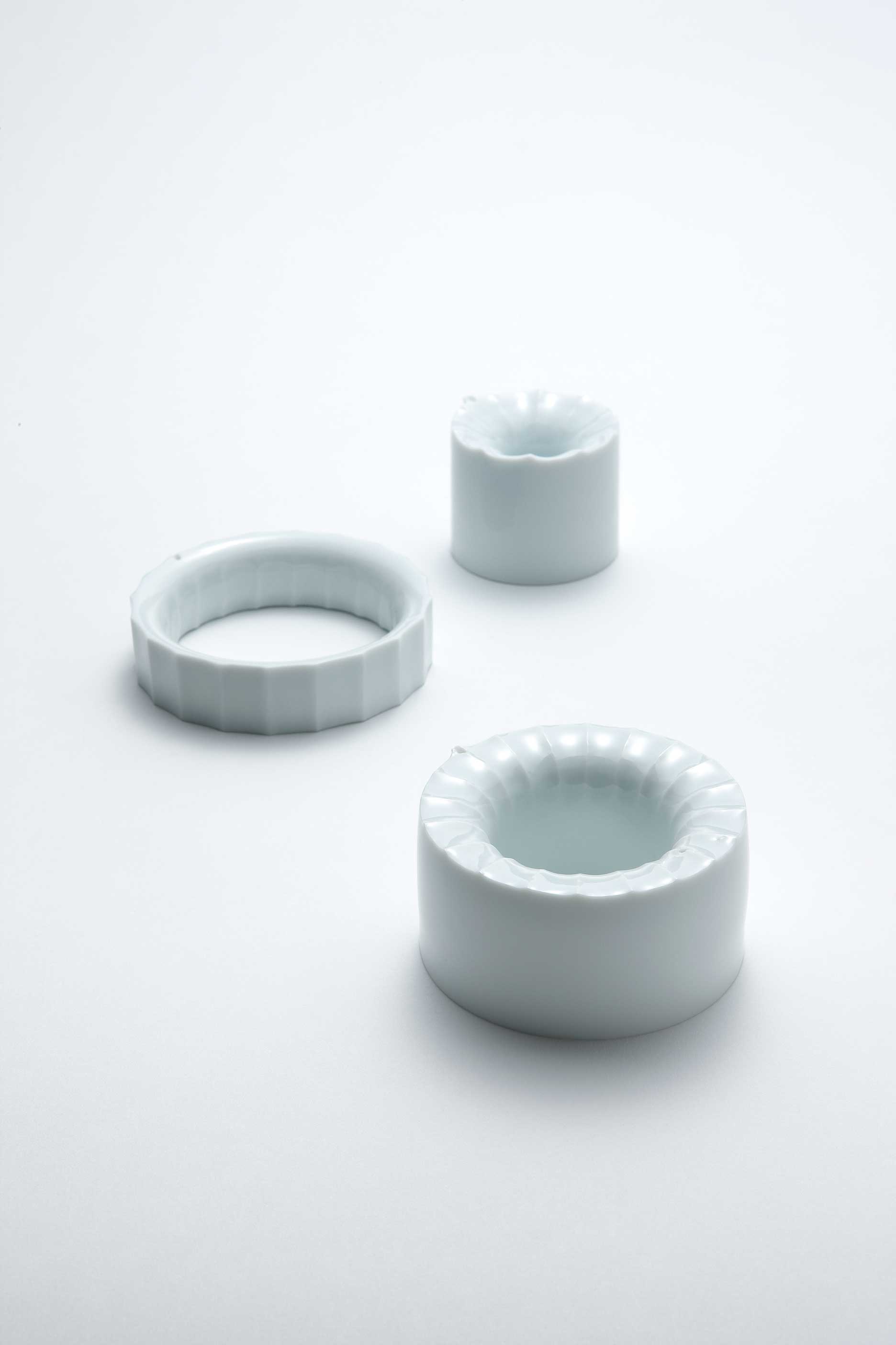 Hye Mi Lee, Water container series, porcelain, 10.2x10.2x2 cm, 7.8x7.8x7 cm, 8x8x5.5 cm, 2013