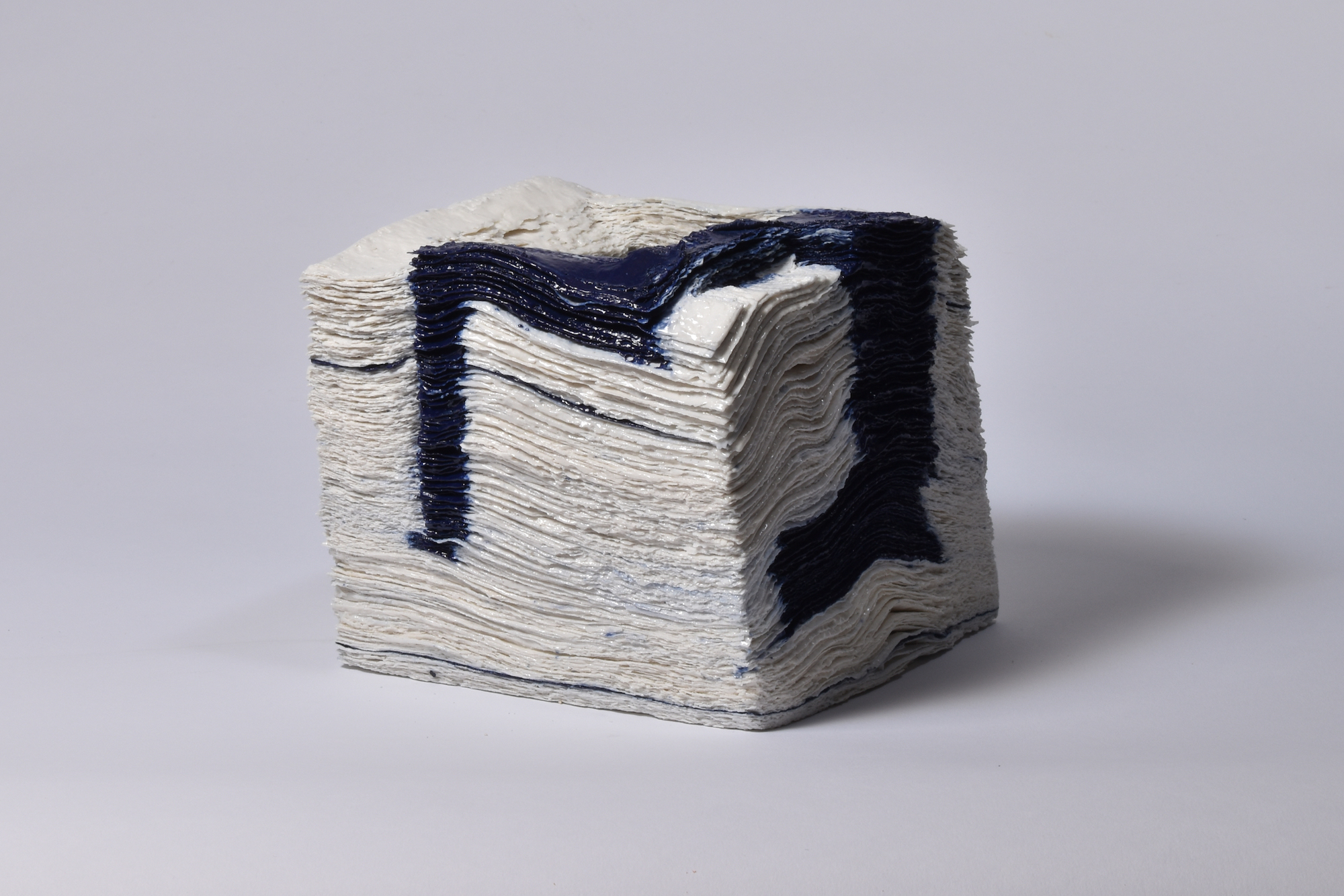 Jongjin Park, Artistic Stratum_WC4, 1000 sheets of tissue paper, porcelain with cobalt Dimensions (W x D x Hcm): 15x15x16cm, 2016 